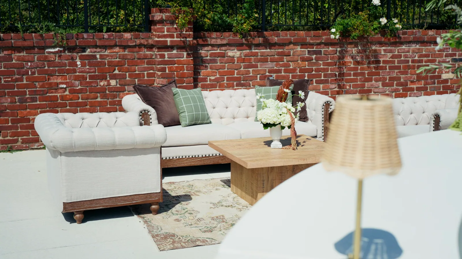 The lounge on the brick-walled patio